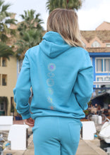 Load image into Gallery viewer, Unisex Sky Blue Luminous Chakra Hoodie
